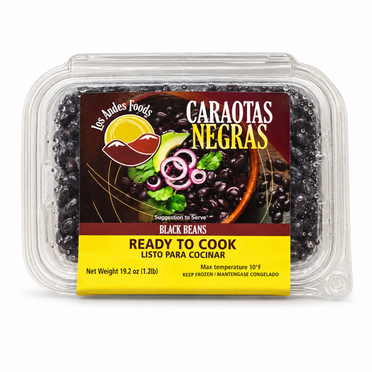 Los Andes Foods Caraotas Negras black beans in a 19.2 oz clear tray with a burgundy and yellow label